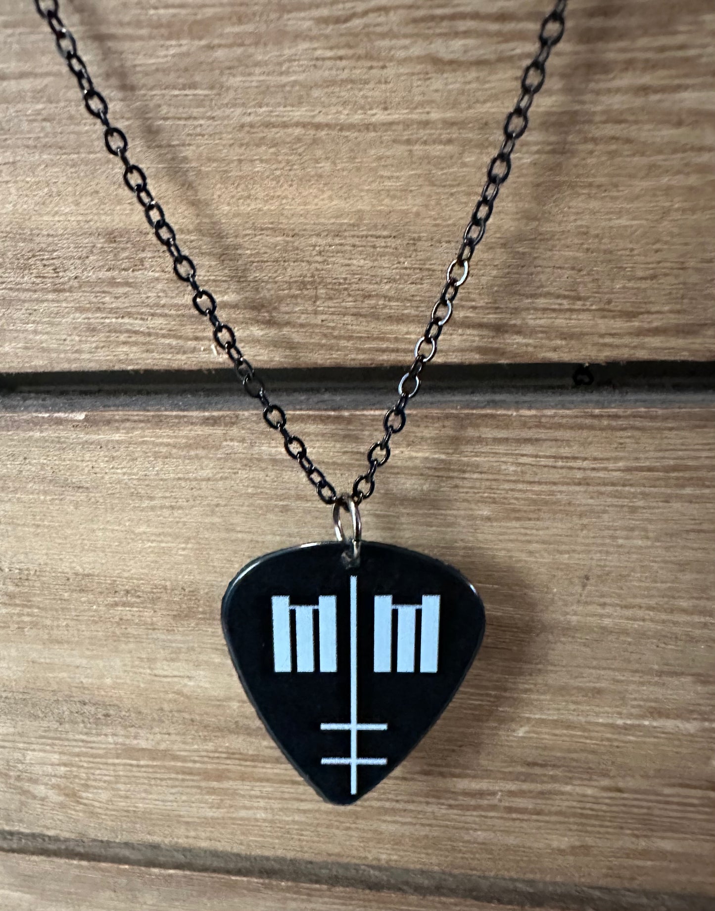 MM guitar pick necklace