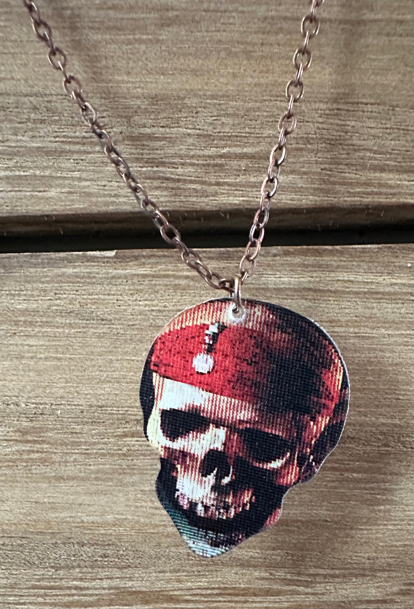 Pirates Motion Guitar Pick Necklace