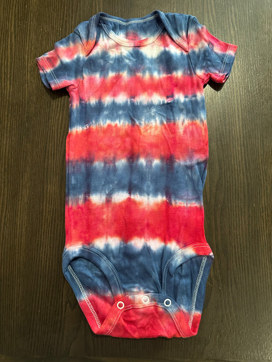 Red, white, & blue accordion Tie-dye baby onesie