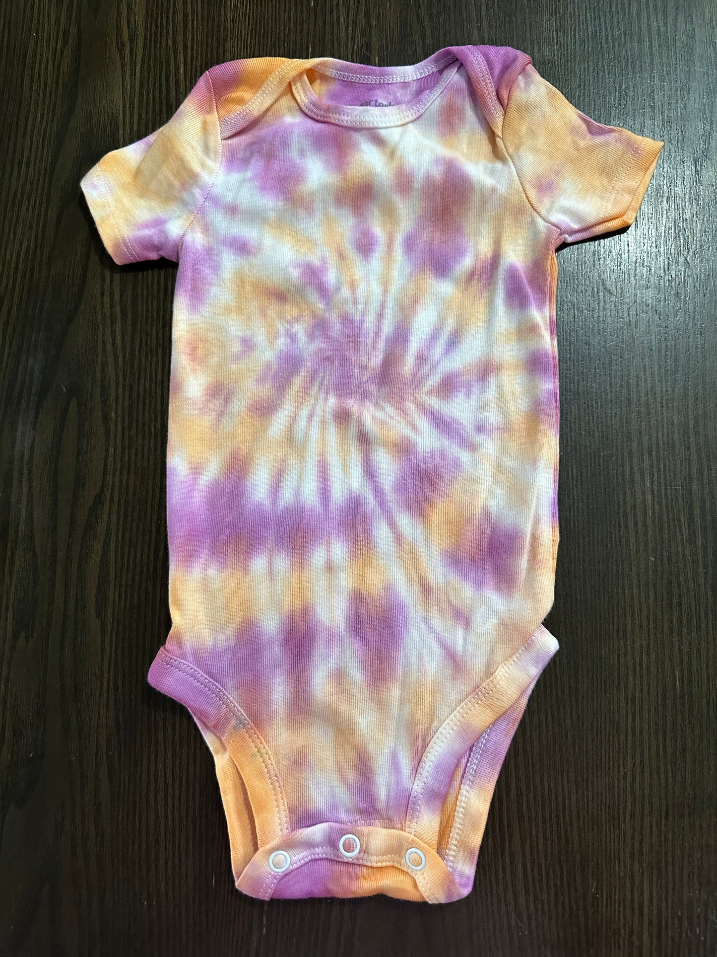 Sherbet Spiral Tie-Dye baby onesie